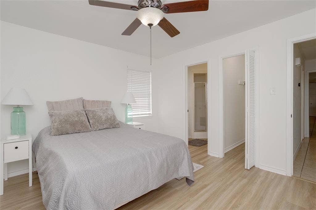 3999 Speegleville Road, Waco, TX 76712 Primary bedroom showing one of the two closets and entrance to bathroom.