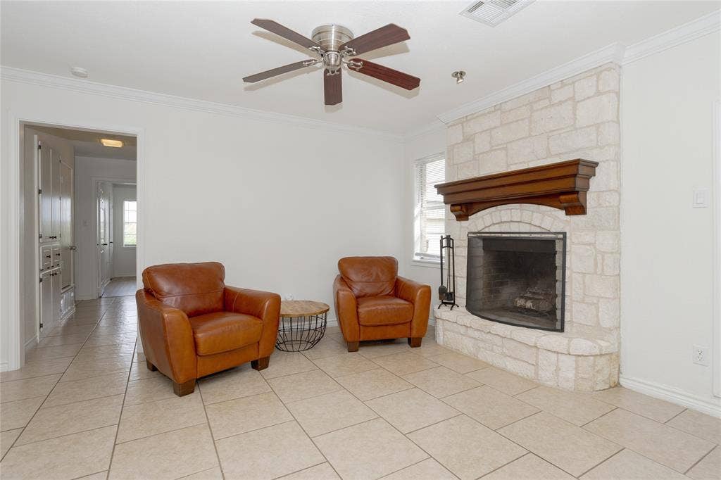 3999 Speegleville Road, Waco, TX 76712 Another view of the living area, with wood burning fireplace.