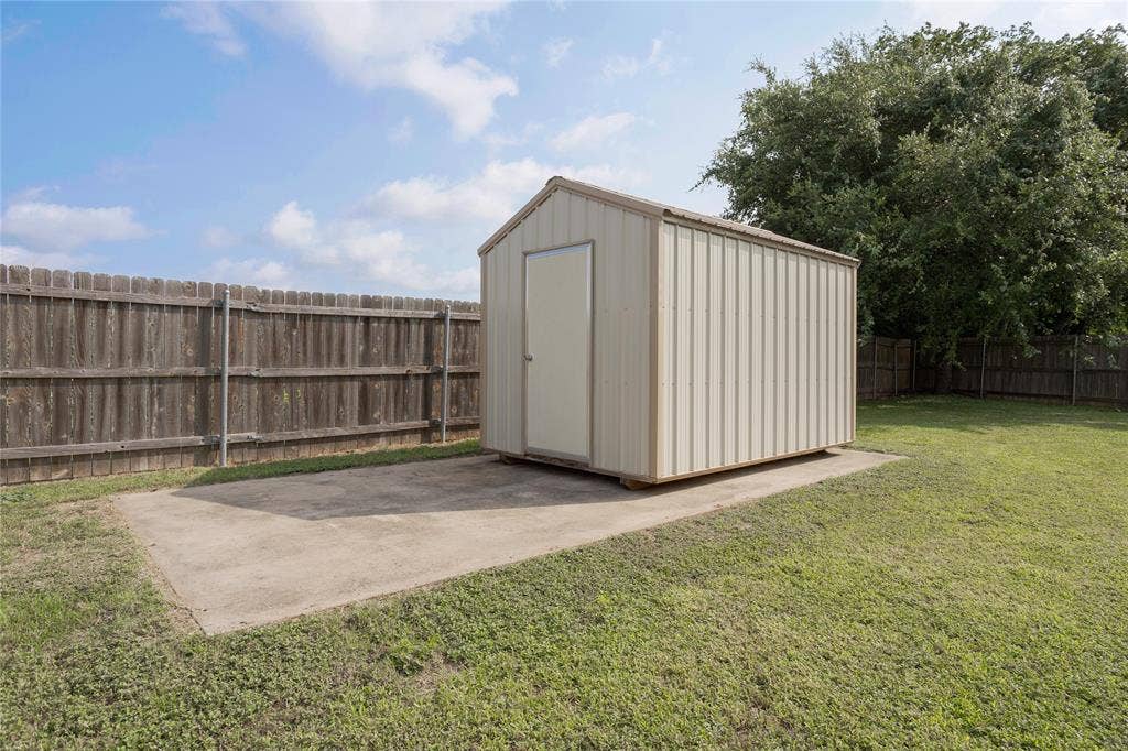 3999 Speegleville Road, Waco, TX 76712 8' X 12' Storage shed, on a concrete pad, in the backyard.