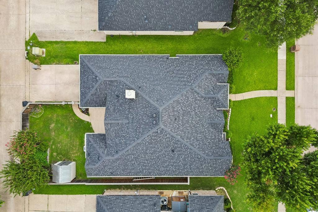 607 Grimsworth Court, Allen, TX 75002 Aerial view of the home showing the footprint of the home. The roof was replaced in 2025.