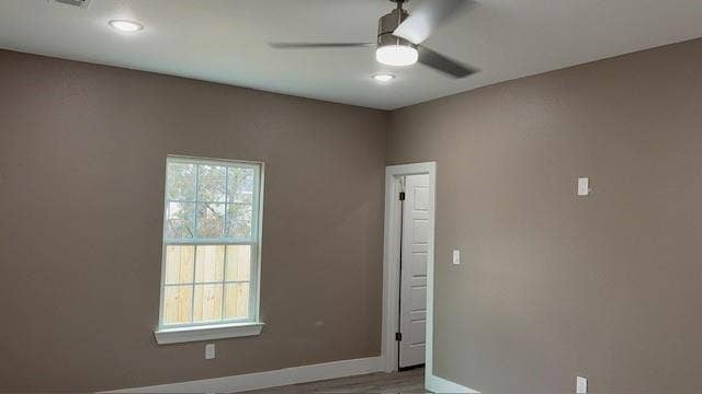 3513 Tomahawk Drive, Granbury, TX 76048 Interior room with neutral-toned walls, a white-framed window, and a white six-panel door