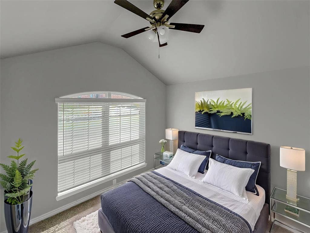 1210 Campbelton Drive, Temple, TX 76504 Virtually stagedVaulted ceiling featuring a ceiling fan with integrated lighting