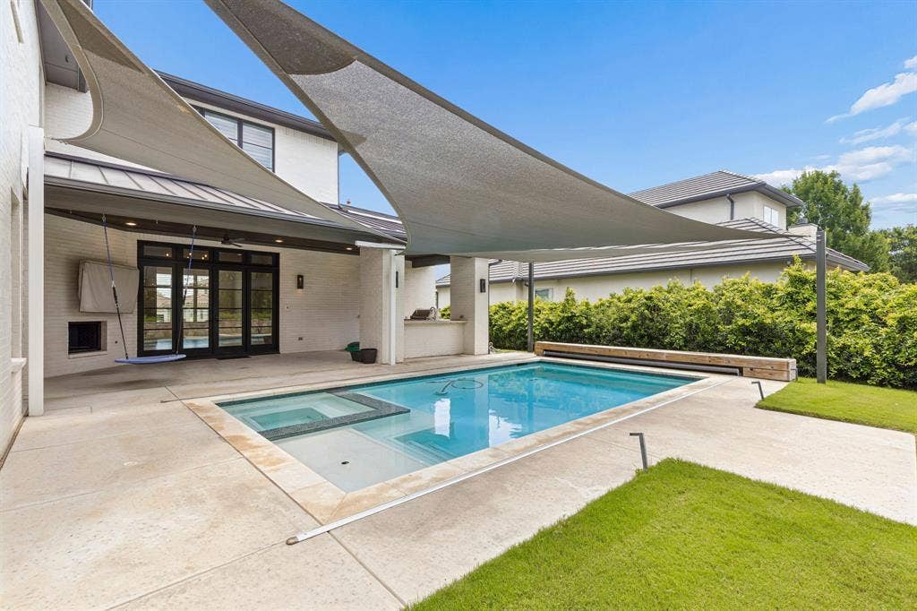 8605 Colina Terrace, Benbrook, TX 76126 Sun sails keep the swimmers and the water cool.
