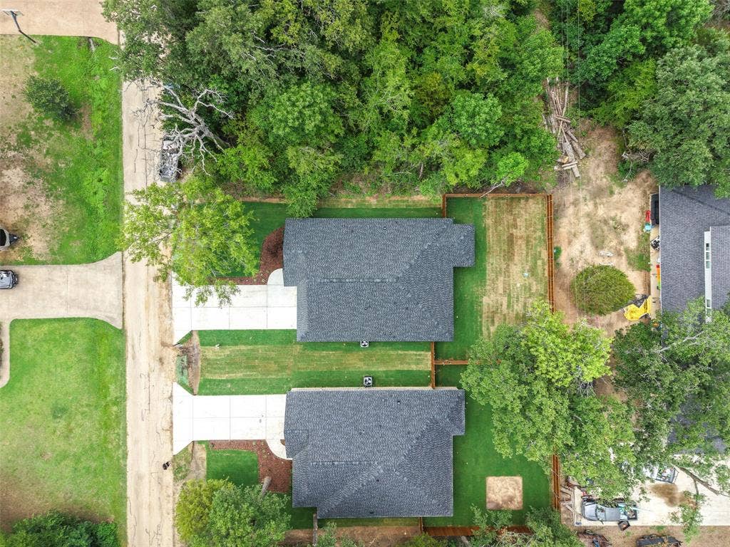 117 Parkside Drive, Trinidad, TX 75163 Aerial perspective showcasing two properties with dark shingle roofs
