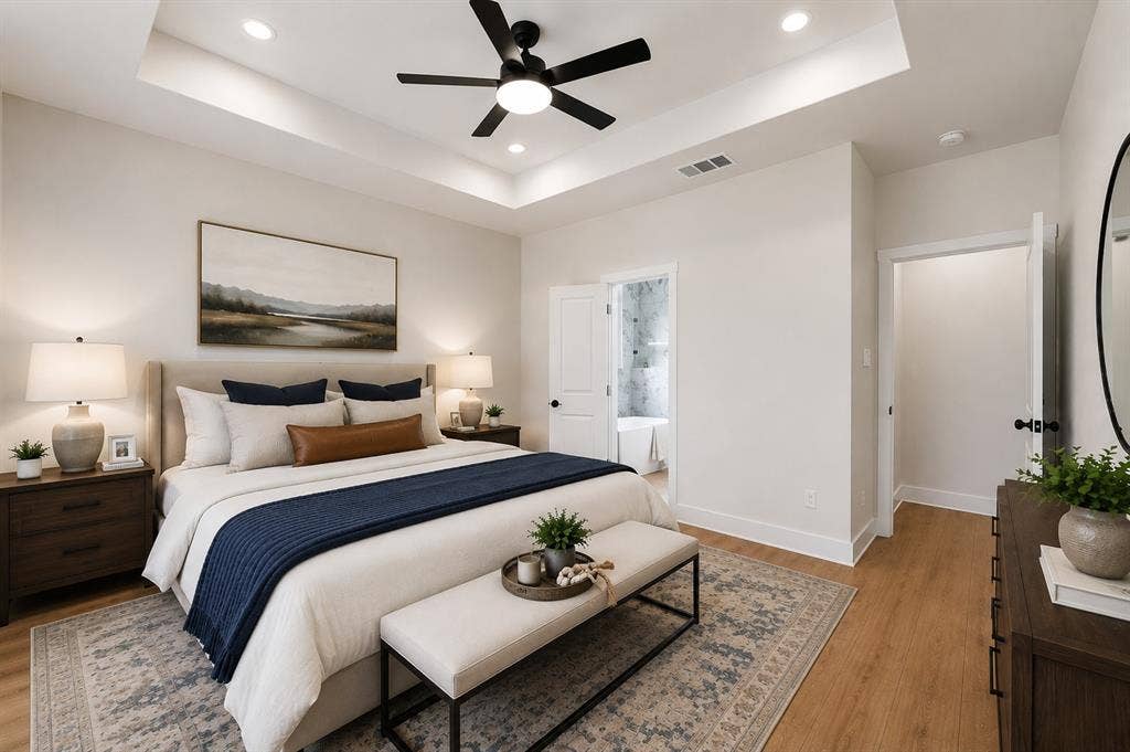 117 Parkside Drive, Trinidad, TX 75163 Recessed lighting illuminating a tray ceiling with a ceiling fan