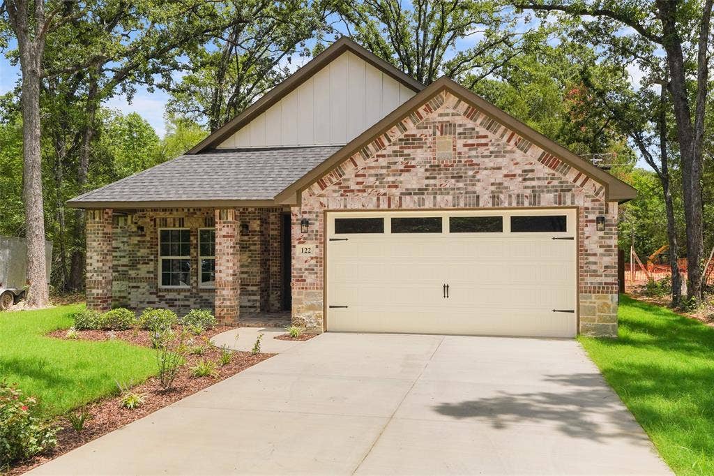 122 E Beachwood Loop, Trinidad, TX 75163 Brick exterior with stone accents and a gabled roofline