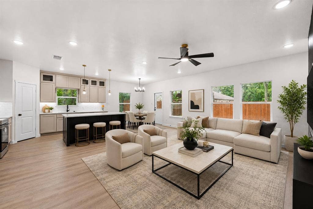 231 E Beachwood Loop, Trinidad, TX 75163 Open-concept living area featuring wood-finish flooring, recessed lighting, and a modern ceiling fan