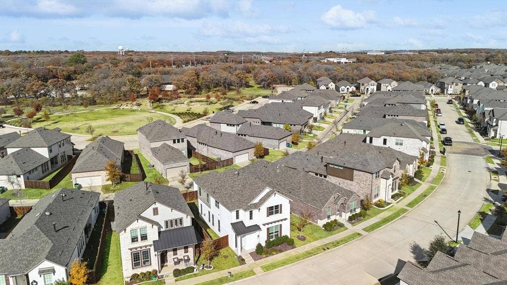 Aerial perspective showcasing a residential development with varied architectural styles
