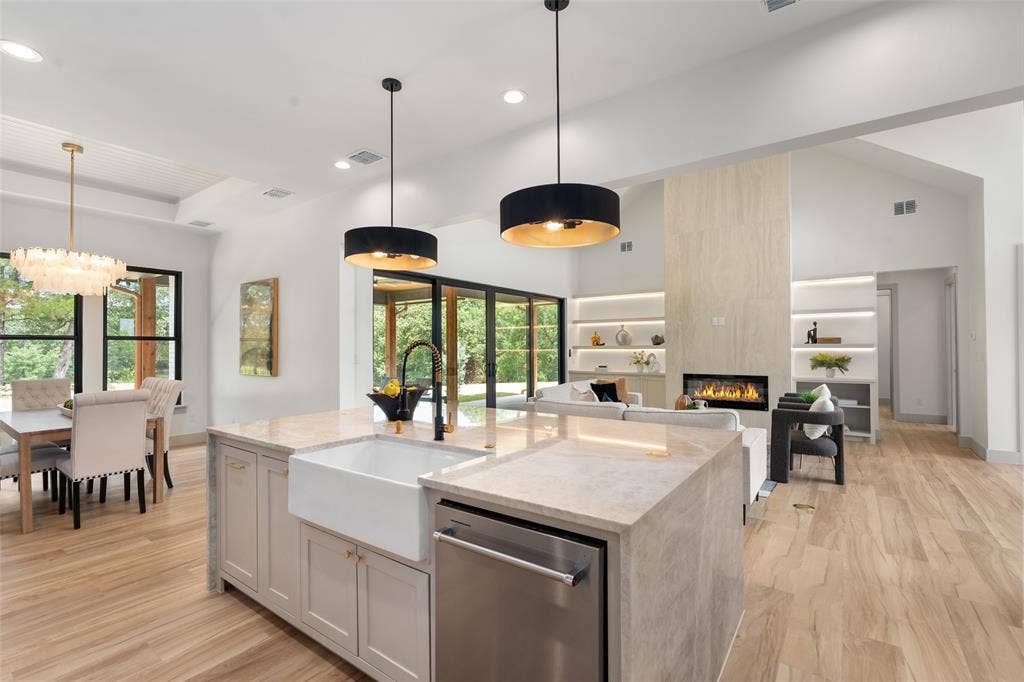 14120 Park Way, Log Cabin, TX 75148 Kitchen island with quartzite waterfall and decorative lighting