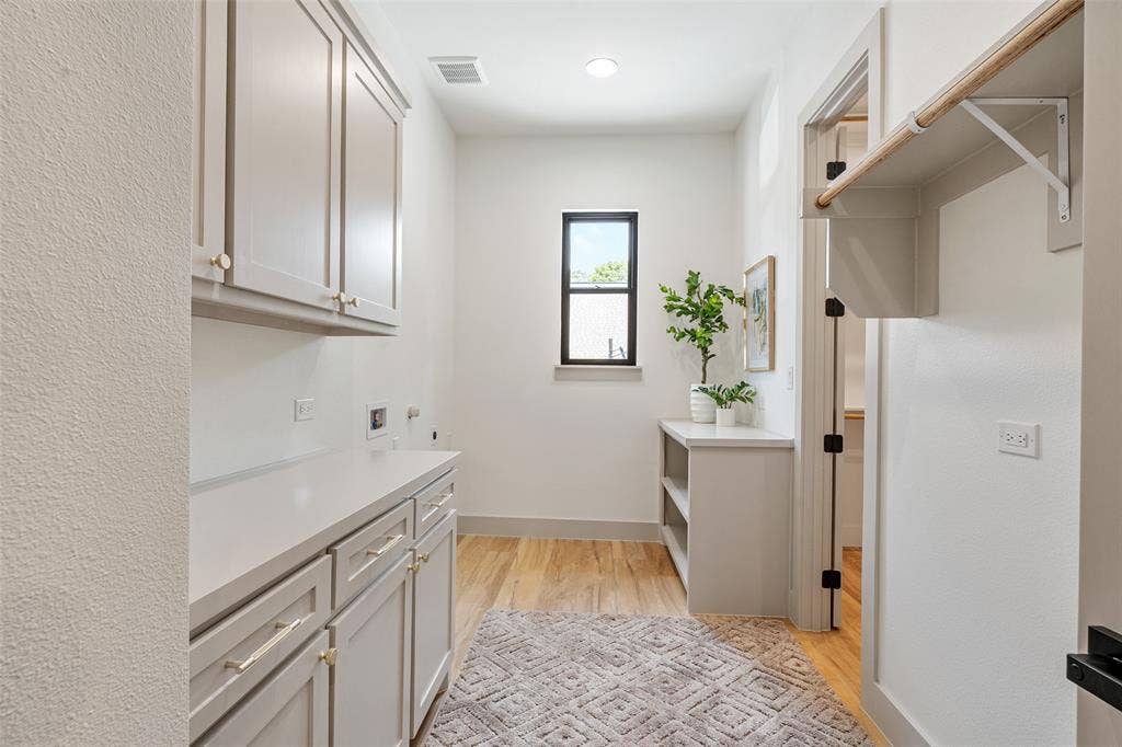 14120 Park Way, Log Cabin, TX 75148 Laundry with built-ins direct access off primaries closet and hall
