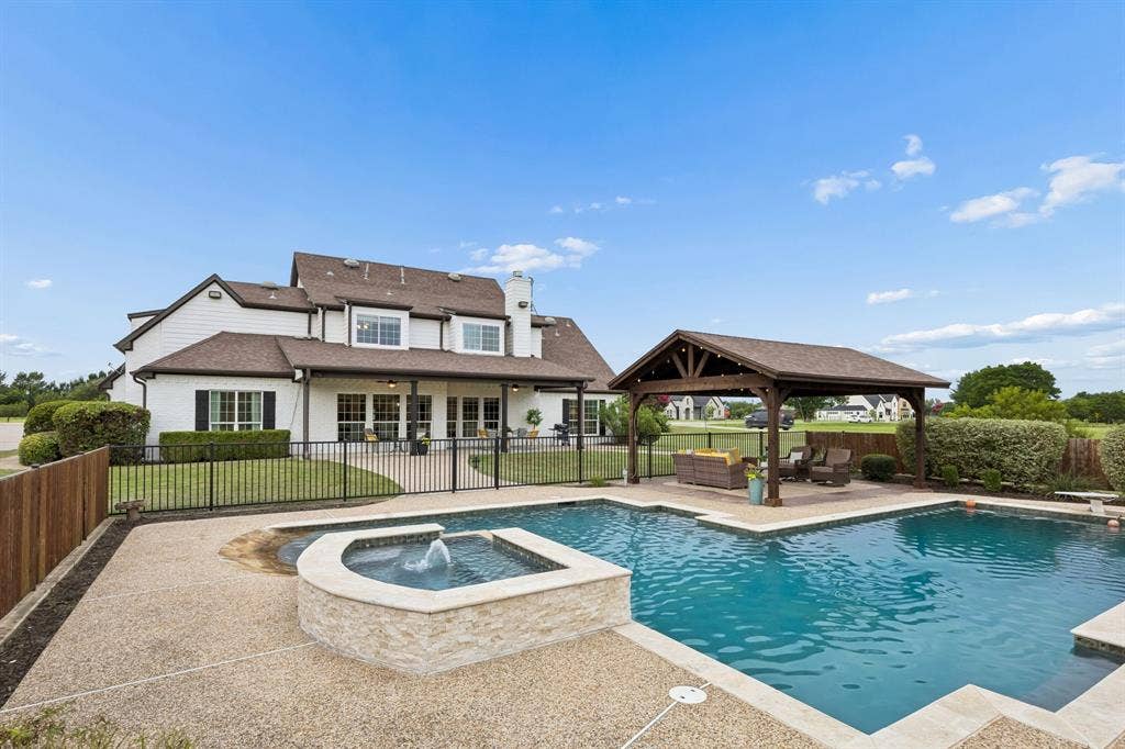 1700 Rock Ridge Road, Lucas, TX 75002 A fence has been added on the north and south sides of the pool for privacy!