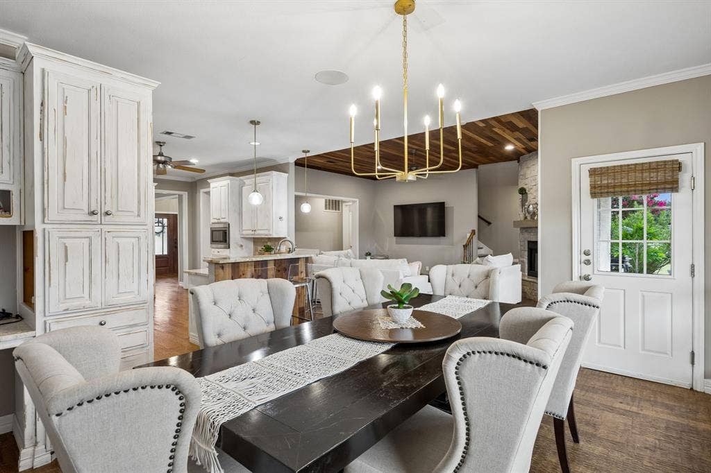 1700 Rock Ridge Road, Lucas, TX 75002 The flow from kitchen to dining to living room is perfect for families and entertaining.