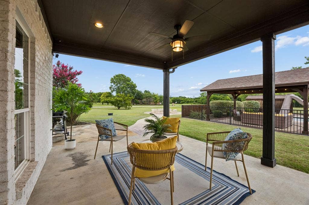 1700 Rock Ridge Road, Lucas, TX 75002 The moment you step outside, everything feels so calm and peaceful. All of the porches are shaded in the evening as the front of the home faces west.