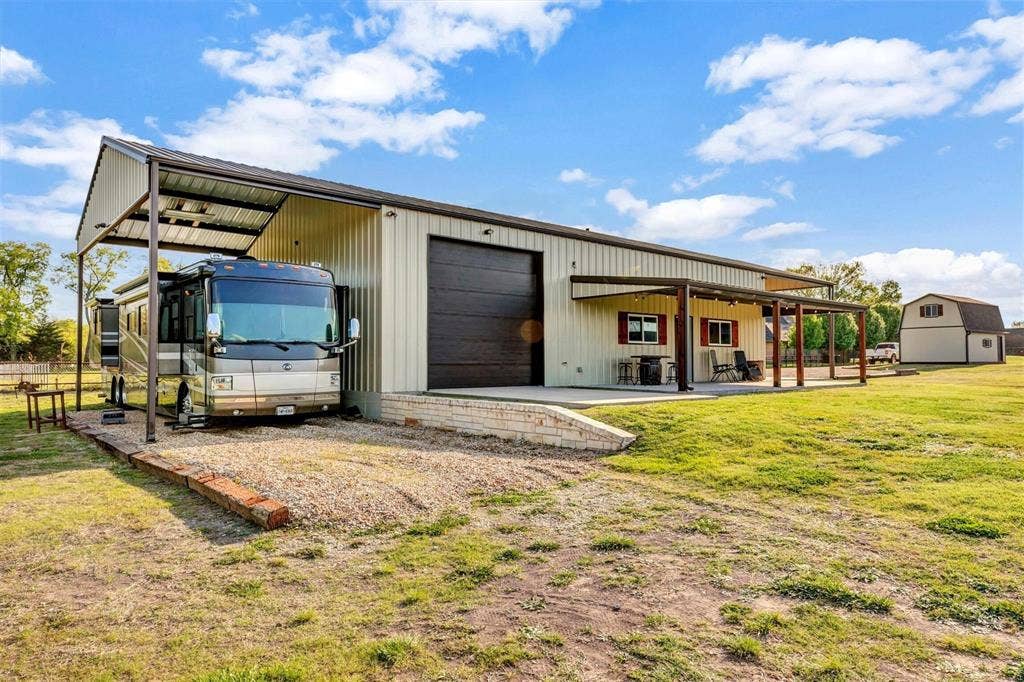 1700 Rock Ridge Road, Lucas, TX 75002 Covered in the back for RV or boat storage.
