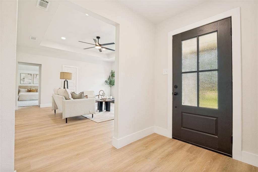 109 Shadow Drive, Red Oak, TX 75154 Entryway featuring a dark paneled door with privacy glass