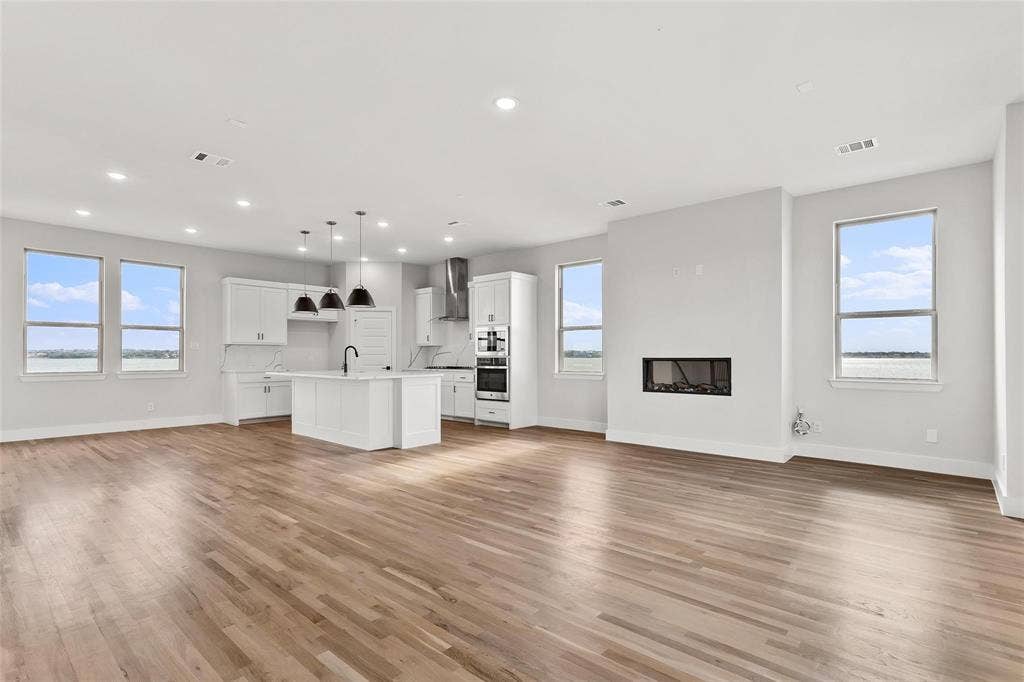 1101 Marc Lane, Rowlett, TX 75088 Expansive living area.Luxury wood like flooring