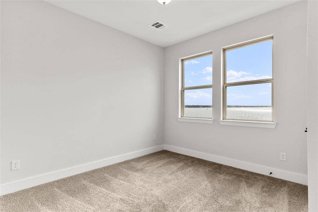1101 Marc Lane, Rowlett, TX 75088 Secondary bedroom with lakeview