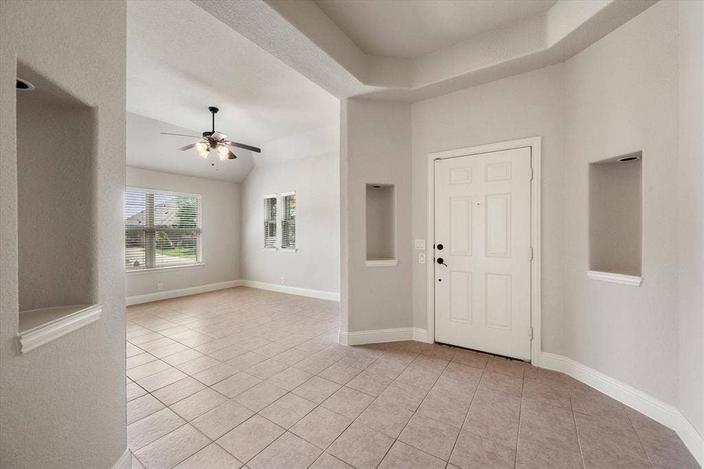 Hallway looking into the formal dining area or could be a flex space