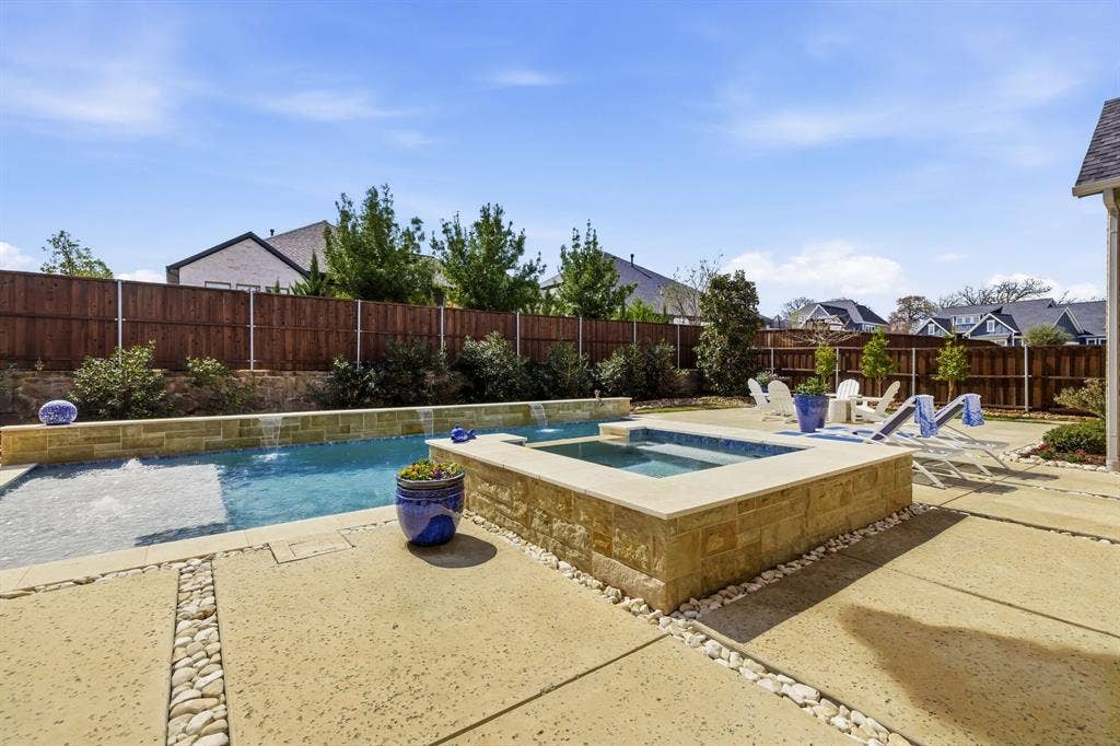 404 Travelers Terrace, Argyle, TX 76226 Swimming pool with raised spa.