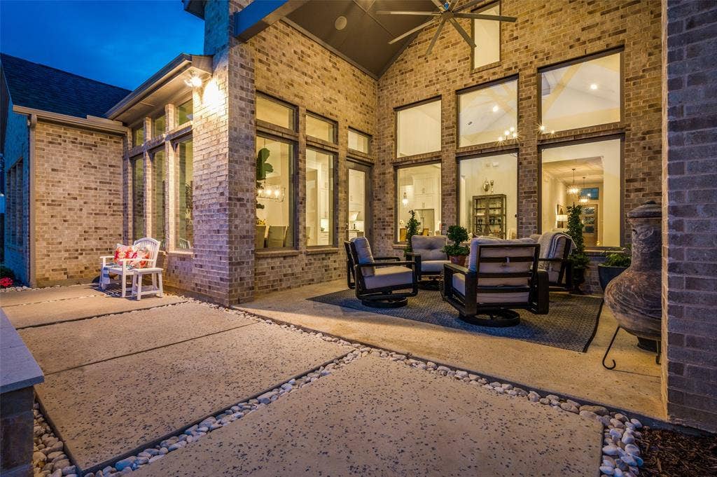 404 Travelers Terrace, Argyle, TX 76226 The large covered patio is a great space to sit and relax. There are two flush mounted Sonos speakers for your listening pleasure.