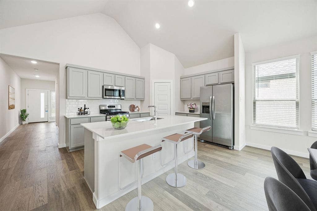 909 Bright Acre Trail, Lavon, TX 75166 Kitchen in the Claret home plan by Trophy Signature Homes – REPRESENTATIVE PHOTO