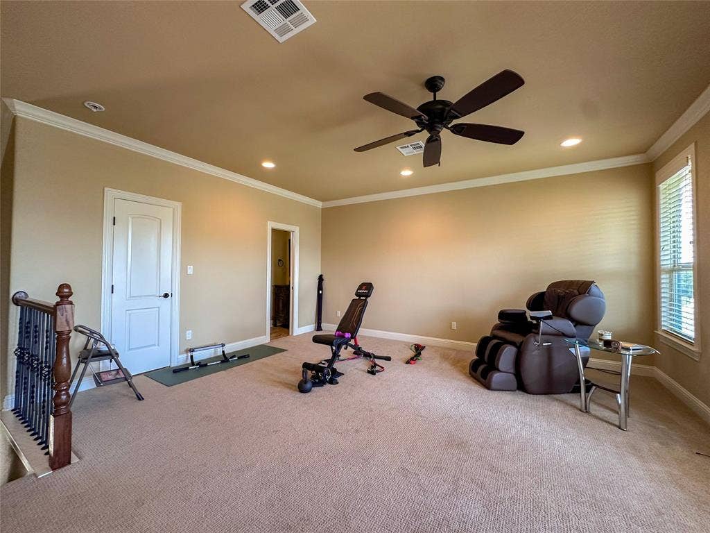 1100 Wessex Drive, Woodway, TX 76712 Carpeted room featuring a ceiling fan, recessed lighting, crown molding, and window blinds