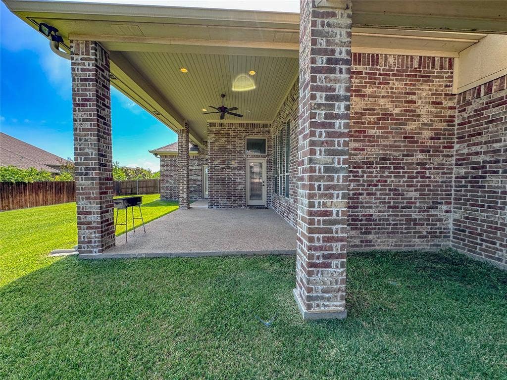 1100 Wessex Drive, Woodway, TX 76712 Covered patio featuring brick pillars, an outdoor ceiling fan, recessed lighting, and a concrete slab