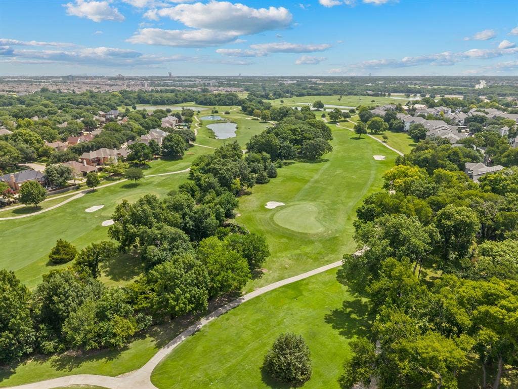 669 Water Oak Drive, Plano, TX 75025 Expansive golf course landscape with manicured greens and mature trees