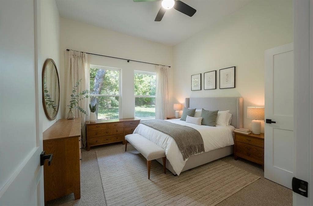 3315 Kyser, Dallas, TX 75216 Spacious bedroom featuring light-colored walls and carpet flooring