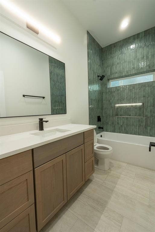 3315 Kyser, Dallas, TX 75216 Contemporary bathroom featuring a light wood-finish vanity with a white countertop and rectangular sink