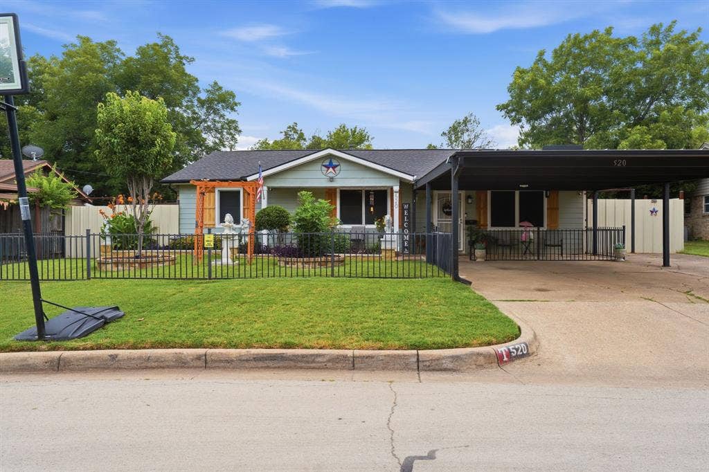 520 Thompson Drive, Saginaw, TX 76179 Single-story residence featuring light blue siding and a dark shingle roof