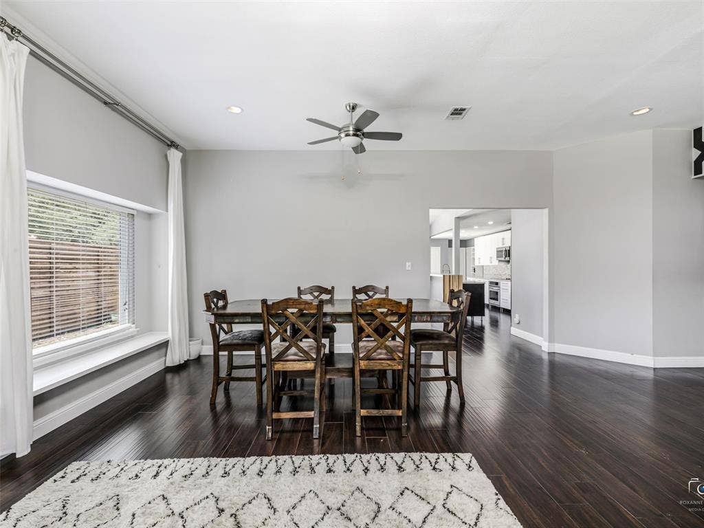 6701 Vero Drive, Plano, TX 75023 The dining room features a window seat window and opens to the kitchen.