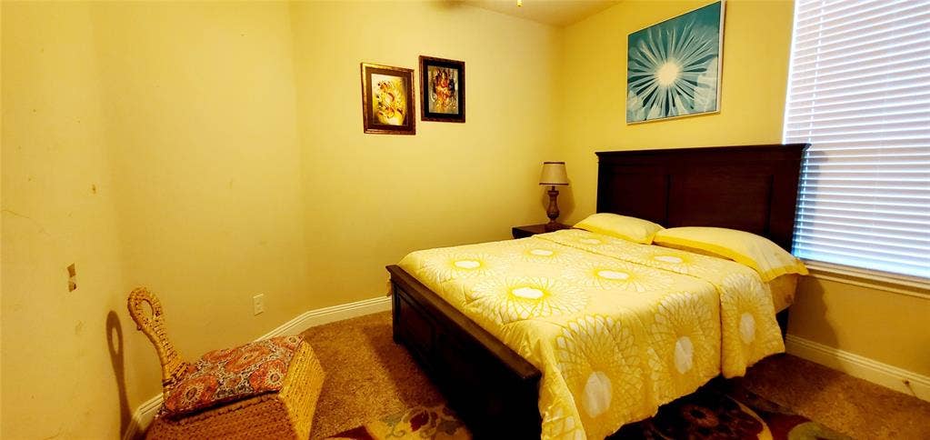104 Rustic Oak Lane, McKinney, TX 75072 Carpeted room featuring light-toned walls and crown molding