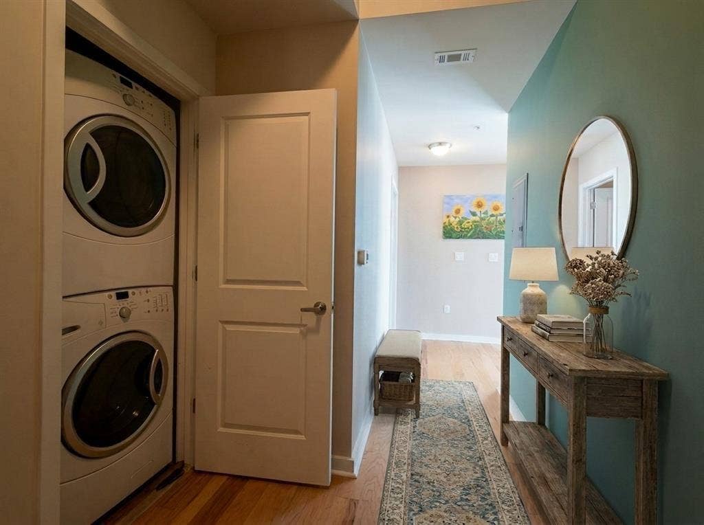 360 Nueces Street, #2110, Austin, TX 78701 Stacked laundry appliances within a dedicated utility closet, Virtually Staged