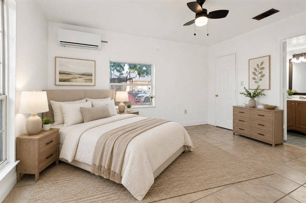 403 N Britain Road, #407B, Irving, TX 75061 Bright room featuring tile flooring, a window, and a ceiling fan