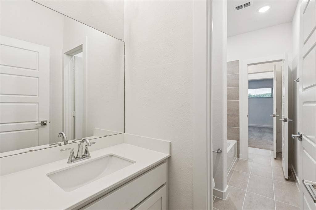 4617 Starlight Drive, McKinney, TX 75071 Bathroom in the Picasso II home plan by Trophy Signature Homes – REPRESENTATIVE PHOTO
