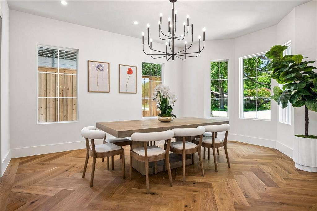 3304 Townsend Drive, Dallas, TX 75229 Formal dining, herringbone hardwood floor, multi-window array, chandelier