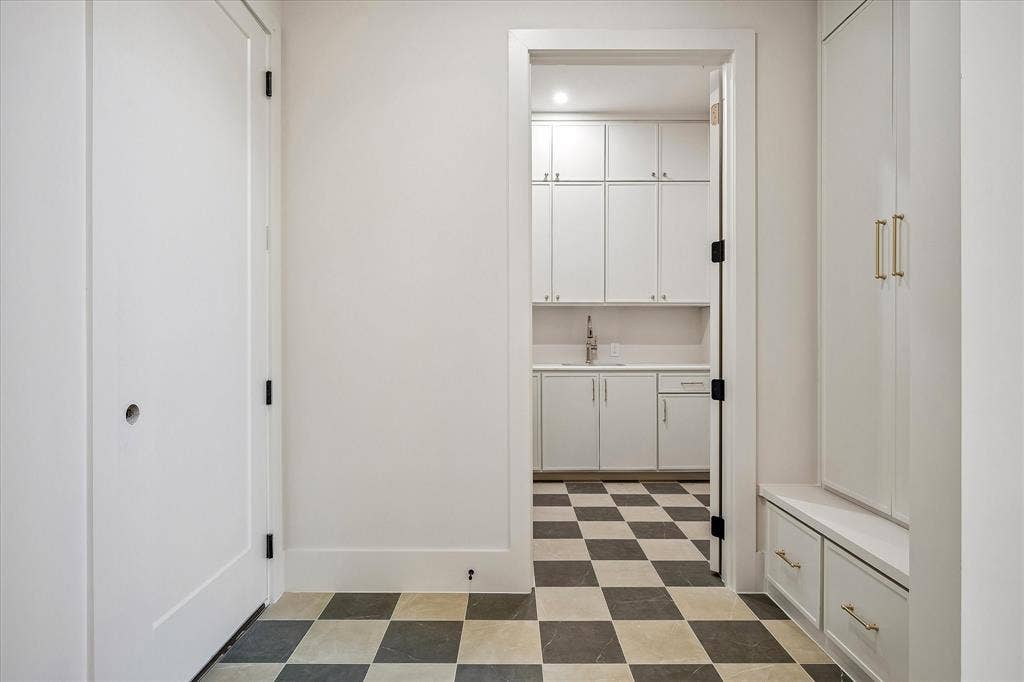 3304 Townsend Drive, Dallas, TX 75229 Mud room, checkered tile floor, built-in cabinetry, access to laundry