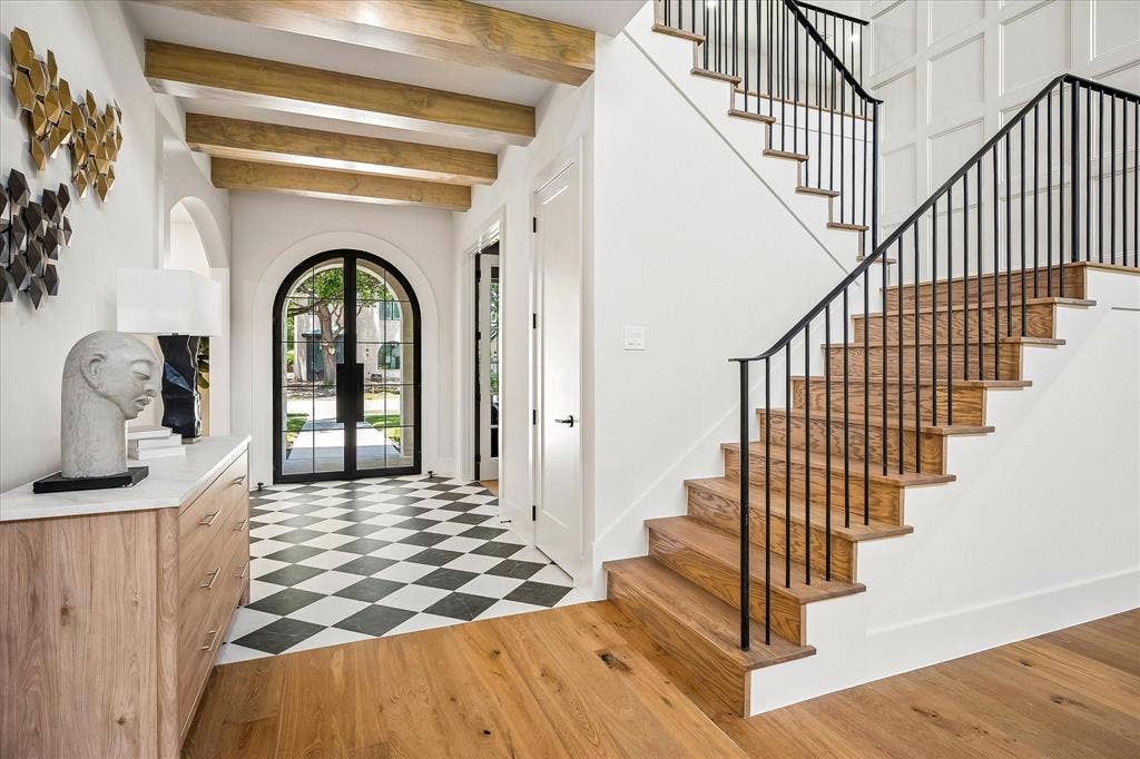 3304 Townsend Drive, Dallas, TX 75229 Entry, checkered marble tile floor, exposed wood beams, iron stair railing, wood treads