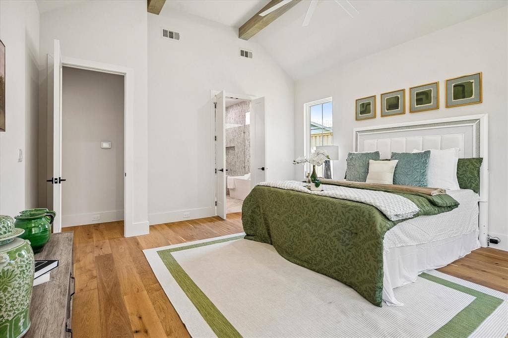 3304 Townsend Drive, Dallas, TX 75229 Primary suite, en suite bath entry, vaulted ceiling with exposed beams