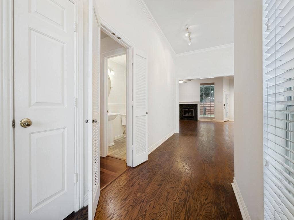 9703 Raven Lane, Irving, TX 75063 Rich wood-finish flooring throughout the main corridor