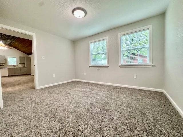 5280 Atwell Lane, #B, Denton, TX 76208 Spacious room featuring neutral grey walls and new grey carpeting