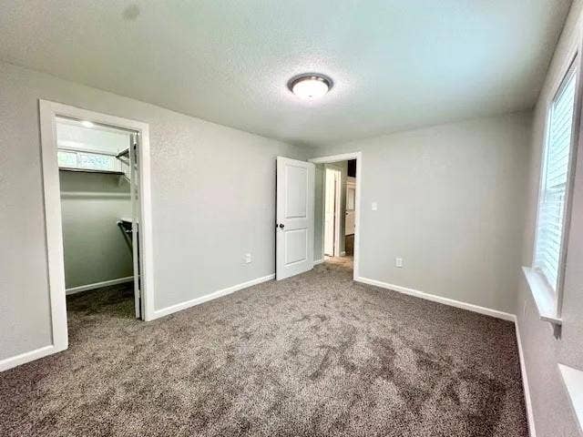 5280 Atwell Lane, #B, Denton, TX 76208 Room featuring neutral wall tones and dark-toned carpeting