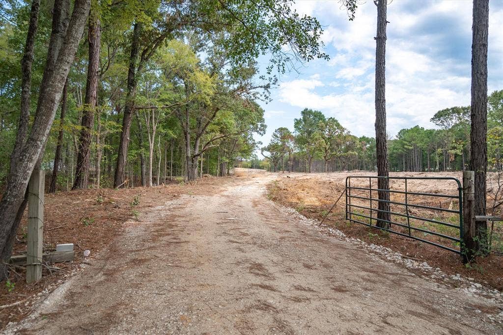 Tract 2 - TBD County Road 4307 Road, Larue, TX 75770 Gated entrance to a cleared parcel with surrounding mature trees and natural landscaping