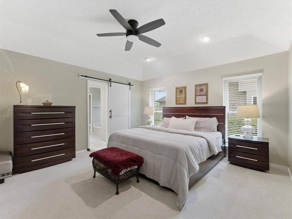 3701 Waycross Court, Arlington, TX 76016 Primary Bedroom featuring vaulted ceilings, recessed lighting, a modern ceiling fan, and light-colored carpeting