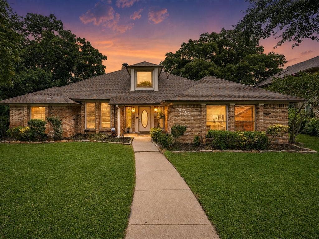 3701 Waycross Court, Arlington, TX 76016 Traditional brick exterior featuring a prominent front door with oval glass inset, a dormer window, and a gabled roofline