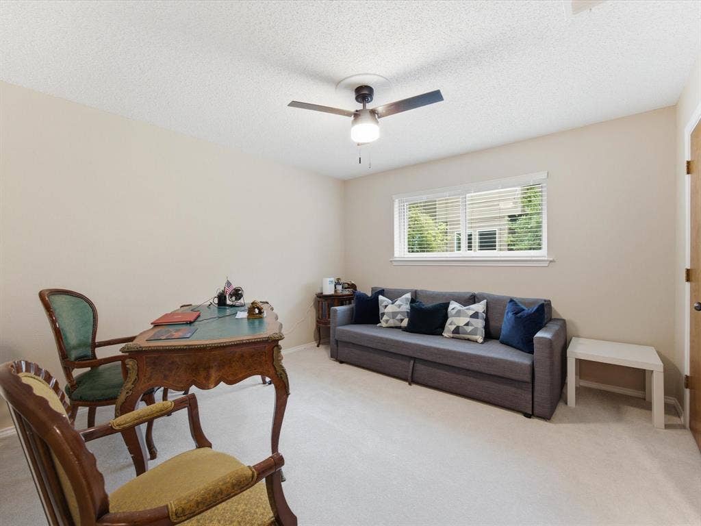 3701 Waycross Court, Arlington, TX 76016 Spacious room featuring neutral carpeting, a ceiling fan, and a window with blinds