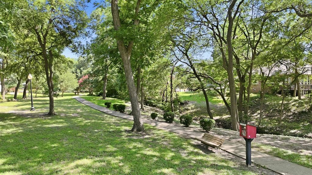 604 Creek View Drive, Prosper, TX 75078 community park with park benches and the litle red library