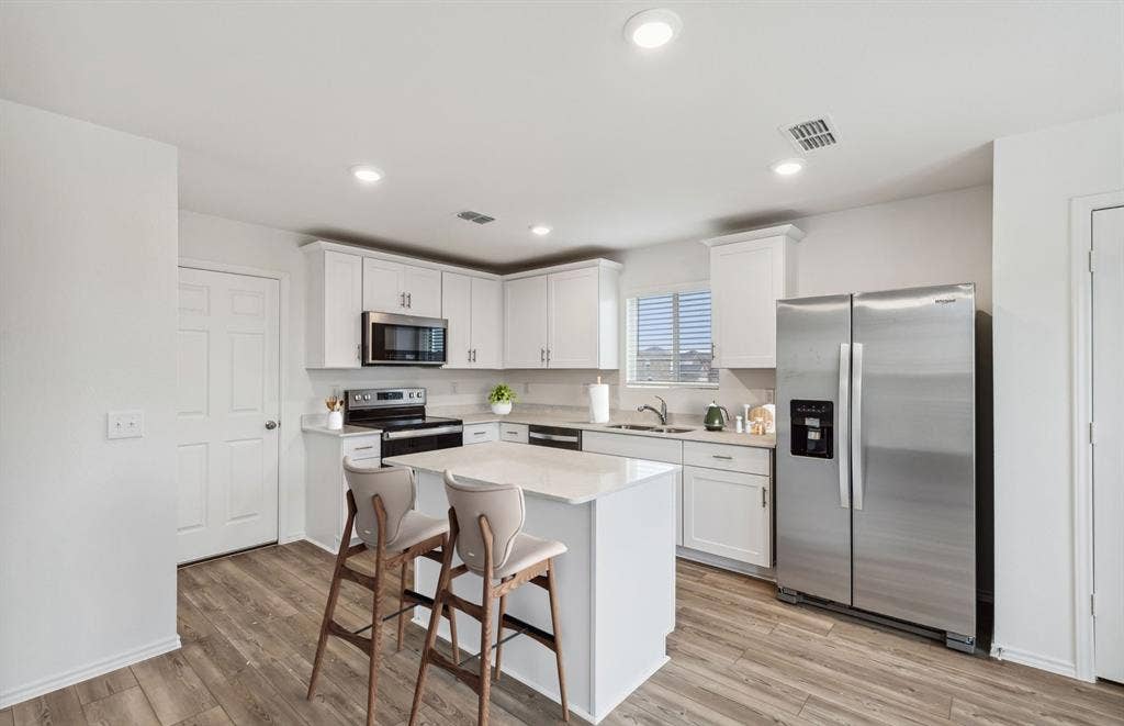 2463 Arbutus Drive, Forney, TX 75126 *Virtual Representation - Spacious kitchen with eat-in bartop island