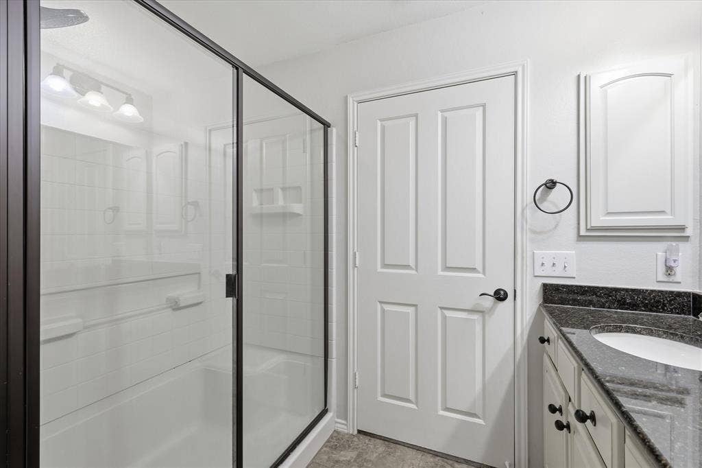 7594 Trull Brook Lane, Frisco, TX 75036 Primary Bathroom with walk in Shower and Walk in Closet